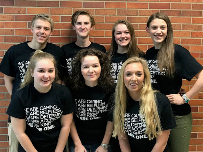 Dow High School students with t-shirts created for the Week of Nonviolence